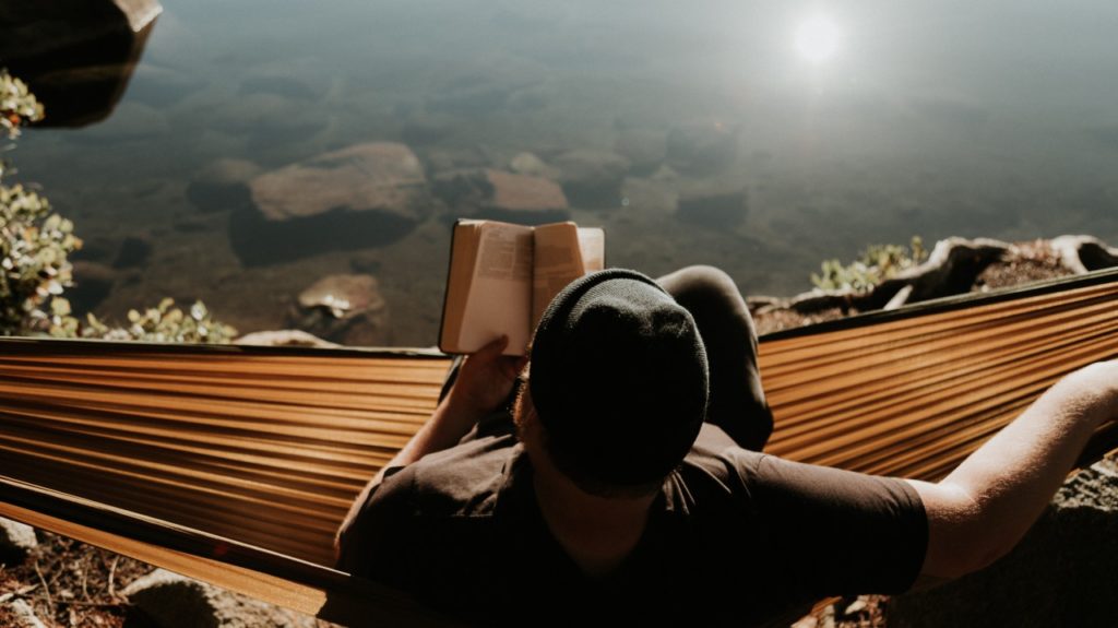 man reading outside