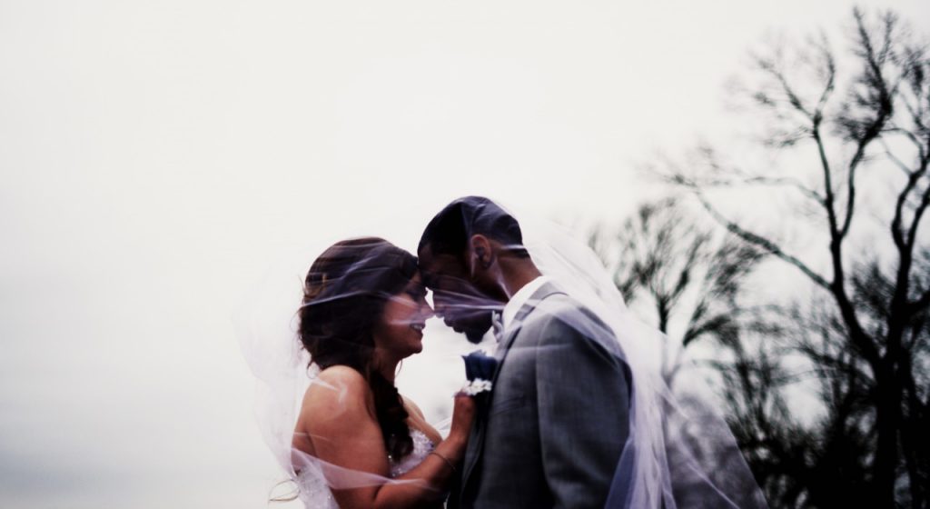 bride and groom standing together