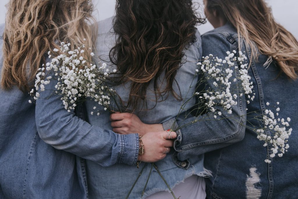 three women standing together