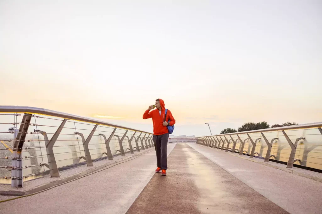 a guy walking on a bridge, learning about his identity in Christ