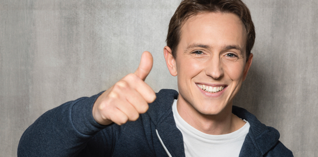 thumbs-up-young-adult-man