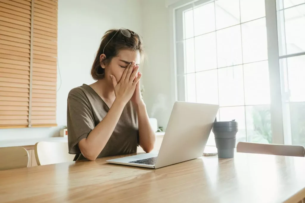 a person frustrated and working a lame job