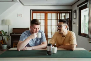 two friends having coffee together