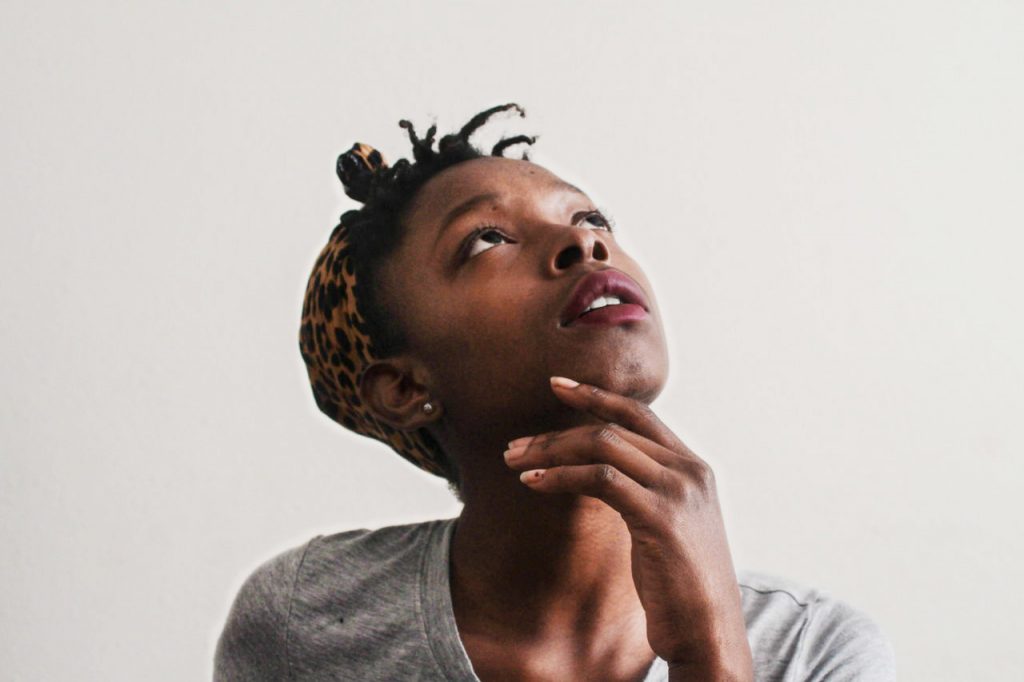 woman thinking, looking up