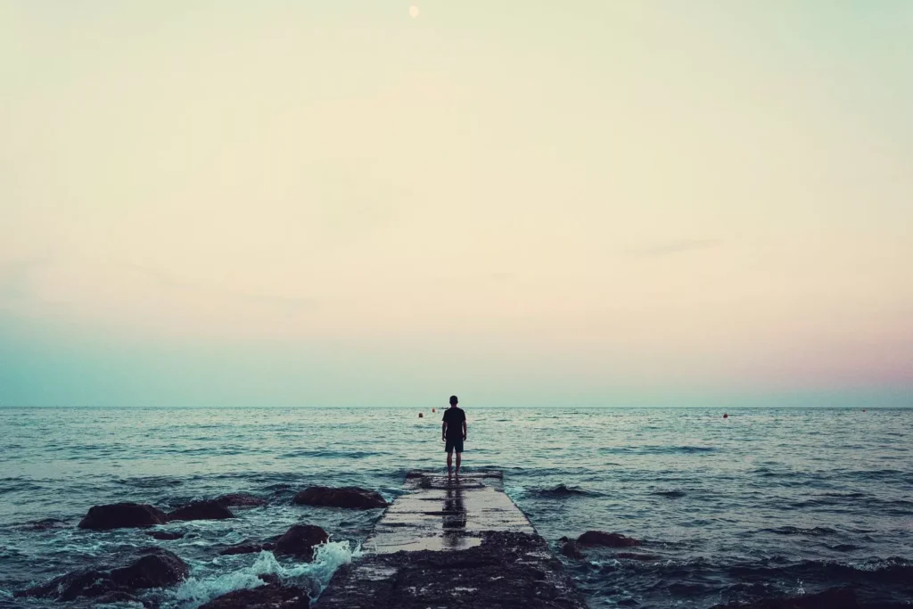 a man standing on a bridge