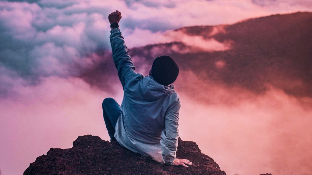 person on top of a mountain