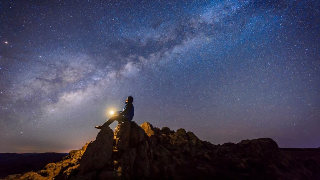 person looking at night sky