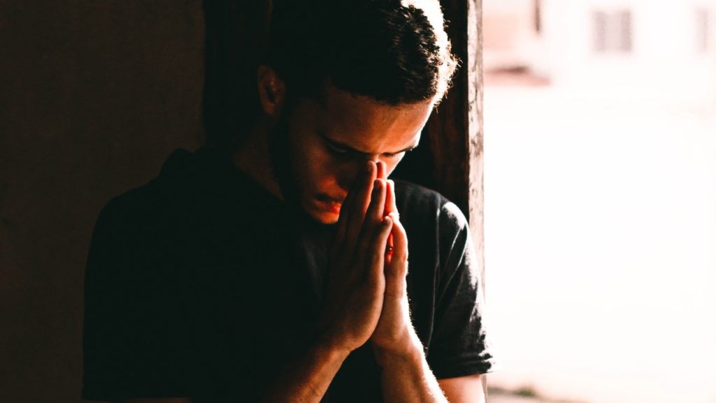man praying