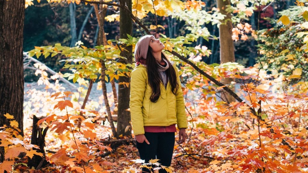 woman in fall forest