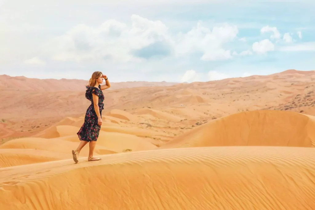 a woman walking and searching in the desert. God is writing her love story