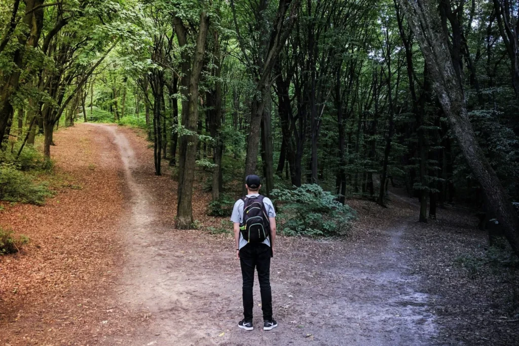 a man choosing between two paths, trying to determine his calling
